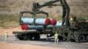RUSSIA -- Missiles of an S-300 air defense missile system are loaded during the Keys to the Sky competition at the International Army Games 2017 at the Ashuluk shooting range outside Astrakhan, August 5, 2017