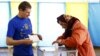 UKRAINE – People cast their ballots during voting in a presidential election at polling station in the village of Kosmach in the Ivano-Frankivsk region of western Ukraine May 25, 2014