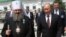 UKRAINE – Vice rector of Kyiv Pechersk Lavra, Metropolitan Pavel (L), and and Russia's president Vladimir Putin at Kyiv Pechersk Lavra. Kyiv, July 27, 2013