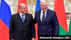 Премьер-министр России Михаил Мишустин и действующий президент Беларуси Александр Лукашенко 3 сентября 2020 года. Фото: AP