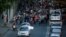 GEORGIA -- People walk during a rally, as they demand Georgia's chief prosecutor Irakly Shotadze's resignation in Tbilisi, May 31, 2018