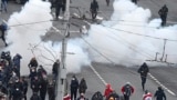 BELARUS -- Belarusian riot police use flash grenades against demonstrators during an opposition rally to protest the official presidential election results in Minsk, November 15, 2020