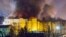 RUSSIA -- Firefighters extinguish a fire at a shopping mall in Kemerovo, March 25, 2018