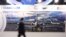 Russia -- A man walks by Russia's Federal Air Transport Agency (Rosaviatsiya) stand at the 11th Transport of Russia international exhibition