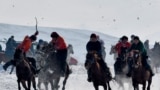 KYRGYZSTAN -- Mounted Kyrgyz riders play the traditional central Asian sport Kok-boru, know also as Buzkashi or Ulak Tartis ("goat grabbing"), near the village of Besh-Kungey, some 20km from Bishkek, February 4, 2018