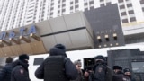 RUSSIA -- Police officers stand in front of a hotel where participants of a forum of independent members of municipal councils gathered in Moscow, March 13, 2021