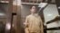 (FILES) US journalist Evan Gershkovich, arrested on espionage charges, stands inside a defendants' cage before a hearing to consider an appeal on his extended pre-trial detention, at the Moscow City Court in Moscow on September 19, 2023.