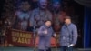 Rakhman Razykov (right) and Narynbek Moldobaev perform a skit in which three Kyrgyz prisoners argue about which of them would be the best president of Kyrgyzstan. 
