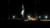 A SpaceX Falcon 9 rocket sits on the pad shortly after a scrub of the launch from Cape Canaveral