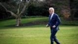 FILE PHOTO: U.S. President Biden walks to board Marine One for travel to Rehoboth Beach, Delaware on the South Lawn of the White House