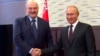 Belarusian President Alyaksandr Lukashenka (left) meets with Russian President Vladimir Putin in the Black Sea resort of Sochi on September 14, 2020.