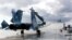 Pictured in this file image dated January 10, 2017 is a Sukhoi Su 33 and a Mikoyan MiG 29K taking off from Russia's Admiral Kuznetsov aircraft carrier in the Mediterranean Sea 