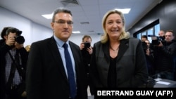 Aymeric Chauprade (left) with far-right French politician Marine Le Pen in 2014.