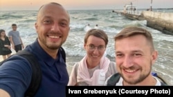 (Left to right) Current Time correspondent Ivan Grebenyuk, news anchor Iryna Romaliiska, and correspondent Yury Baranyuk in Odesa, Ukraine on August 8, 2020.
