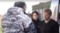 RUSSIA -- Vyacheslav Vishnevsky (right), a co-owner of the Zimnyaya Vishnya mall, is detained after being extradited from Poland to Russia, in Kaliningrad region, March 24, 2020