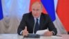 RUSSIA -- Russian President Vladimir Putin chairs a meeting on fuel and energy issues in Kemerovo Region, August 27, 2018