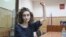 RUSSIA -- Alla Gutnikova, one of the four DOXA magazine editorial staff members, attends a court hearing in Moscow, April 14, 2021