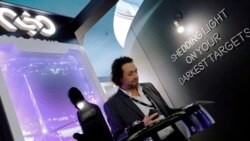 At the annual 2020 European Police Congress in Berlin, Germany, NSO Group, the Israeli technology firm that sells Pegasus spyware, touts the firm's "shedding light on your darkest targets."