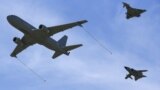 Italy -- Military planes fly in formation during a NATO military exercise at the Birgi NATO Airbase in Trapani, October 19, 2015