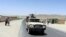 AFGHANISTAN -- Taliban fighters patrol inside the city of Ghazni, August 13, 2021