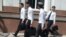 turkmenistan. turkmen students as they leaving university in ashgabat