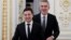 UKRAINE -- Ukrainian President Volodymyr Zelenskiy and NATO Secretary-General Jens Stoltenberg react while entering a hall following their talks in Kyiv, October 31, 2019