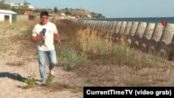 Корреспондент Настоящего Времени на пляэе в Коблево