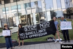 A July 25, 2021 protest outside the offices of the technology firm NSO Group in Herzliya, Israel