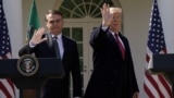 White House in Washington, U.S. - Brazil's President Jair Bolsonaro and U.S. President Donald Trump / Brazil's President Jair Bolsonaro and U.S. President Donald Trump wave as they depart at the conclusion of a joint news conference in the Rose Garden of 