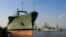 Sudan -- The Iranian Kharg replenishment ship (L) and the Corvette Admiral Naghdi (R) are seen docked in the Red Sea town of Port Sudan, 31Oct2012