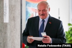 Belarusian President Alyaksandr Lukashenka casts his ballot in Minsk on August 9, 2020.