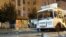 RUSSIA -- A burned down passenger bus is pictured by the Galereya Chizhova [Chizhov’s Gallery] shopping center in Voronezh, August 12, 2021