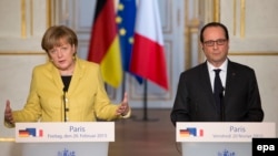 Ангела Меркель и Франсуа Олланд (Париж, 20 февраля 2015 года)
