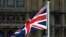 U.K. – The flag of Great Britain and the flag of Ukraine fly in front of the Houses of Parliament on Ukraine Independence Day in London, August 24, 2022