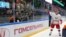 BELARUS -- Belarusian President Alyaksandr Lukashenka throws a toy to spectators after an amateur ice hockey game, as competitions in Belarus continue despite the rest of major sports events were shut down because of the outbreak of coronavirus disease (C