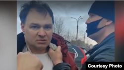Скриншот с видео задержания Геннадий Трубина