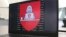 The logo of Belarus' Cyberpartisans hacker group features red and white, colors used by the Belarusian opposition.