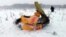 RUSSIA -- A piece of debris of the crashed Russian Saratov Airlines Antonov AN-148 passenger plane lies in the snow near the Stepanovskoy village near Argunovo, Ramensky district, Moscow region, February 11, 2018