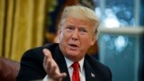 U.S. -- U.S. President Donald Trump speaks during an interview with The Associated Press in the Oval Office of the White House, in Washington, October 16, 2018