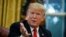 U.S. -- U.S. President Donald Trump speaks during an interview with The Associated Press in the Oval Office of the White House, in Washington, October 16, 2018