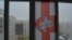 Belarus - National flag on the balcony of a city apartment 