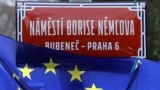 CZECH REPUBLIC -- An EU flag flutters near an unveiled sign carrying the name of slain Russian political opposition leader Boris Nemtsov during a ceremony to rename a square near the Russian Embassy into "Boris Nemtsov Square", in Prague, February 27, 202