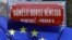 CZECH REPUBLIC -- An EU flag flutters near an unveiled sign carrying the name of slain Russian political opposition leader Boris Nemtsov during a ceremony to rename a square near the Russian Embassy into "Boris Nemtsov Square", in Prague, February 27, 202