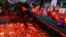 Russia -- Lit candles are placed at a makeshift memorial for the victims of a fire in the Zimnyaya Vishnya shopping center in the West Siberian city of Kemerovo, Russia, 26Mar2018