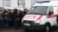 RUSSIA -- Reltives of children seeking medical care following an outburst of landfill gas at the Yadrovo solid waste landfill stand outside a hospital in Volokolamsk, March 21, 2018