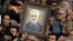 Iran - a portrait of Qasem Soleimani, the Iranian commander who led the elite Quds Force wing of the Islamic Revolutionary Guards Corps (IRGC). screen grab