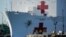 U.S. -- The hospital ship USNS Mercy arrives at the Port of Los Angeles to assist area medical facilities during the outbreak of the coronavirus disease (COVID-19) in San Pedro, California, U.S., March 27, 2020.   