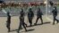 BELARUS -- Belarusian police pass the site where a protester died last night in Minsk, August 11, 2020