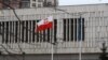 RUSSIA -- The Polish flag flies on Polish embassy in MOscow, March 26, 2018