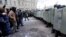RUSSIA – Protesters stand in front of police during a protest against the jailing of opposition leader Alexei Navalny in St. Petersburg, Russia, Sunday, Jan. 31, 2021
